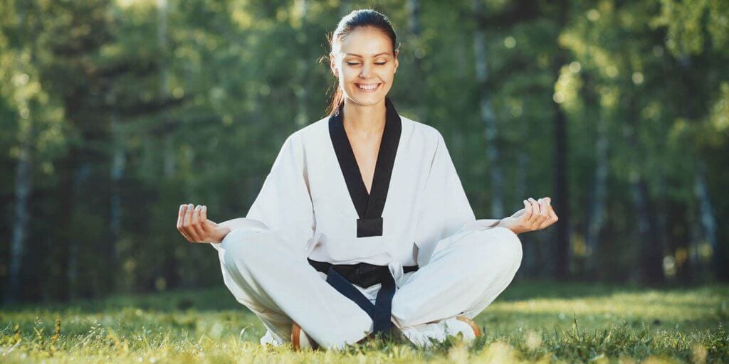 Martial Arts Lessons for Adults in Campbell CA - Happy Woman Meditated Sitting Background